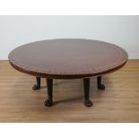 A LARGE REGENCY STYLE COROMANDEL BANDED MAHOGANY CIRCULAR CENTRE TABLE