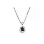 A SAPPHIRE AND DIAMOND PENDANT WITH A WHITE GOLD NECKCHAIN