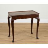 A GEORGE III RECTANGULAR MAHOGANY PAD FOOT SILVER TABLE