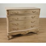A 20TH CENTURY BUFF PAINTED CARVED FOUR DRAWER SERPENTINE CHEST