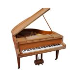 BLUTHNER OF LEIPZIG; AN EARLY 20TH CENTURY OAK CASED IRON FRAMED OVER-STRUNG BABY GRAND PIANO