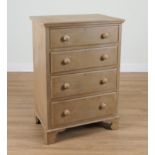A GREEN PAINTED PINE FOUR DRAWER CHEST OF DRAWERS