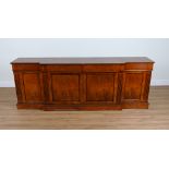 POSSIBLY BRIGHTS OF NETTLEBED; A GEORGE III STYLE POLLARD OAK BREAKFRONT SIDE CABINET