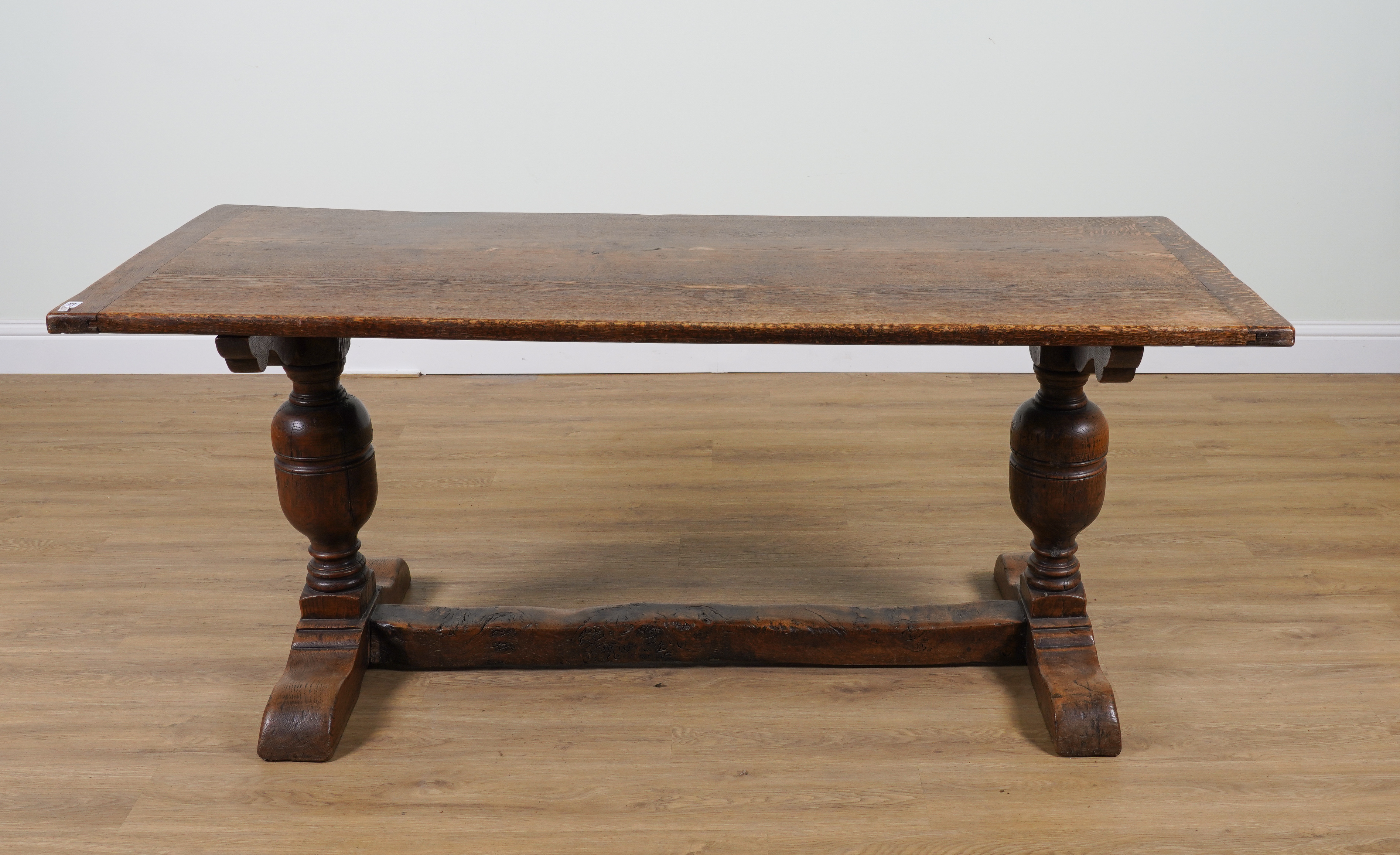 A 17TH CENTURY STYLE OAK CLEATED PLANK TOP REFECTORY TABLE