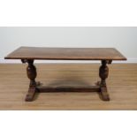 A 17TH CENTURY STYLE OAK CLEATED PLANK TOP REFECTORY TABLE