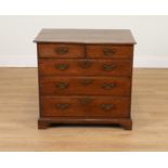 A MID-18TH CENTURY OAK FIVE DRAWER CHEST OF DRAWERS