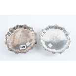 A PAIR OF GEORGE II SILVER SHAPED CIRCULAR WAITERS (2)