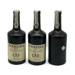 THREE BOTTLES OF FERREIRA PORT 1977 (3)