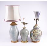 A CHINESE CRACKLE GLAZED CELADON PORCELAIN AND GILT-METAL MOUNTED TABLE LAMP (3)