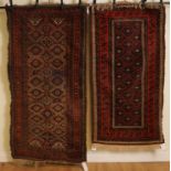 A BELUCHISTAN RUG AND ONE OTHER (2)
