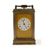 A FRENCH GILT-BRASS CORNICHE CASED STRIKING BELL CARRIAGE CLOCK