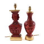 TWO CHINESE CINNABAR LACQUER RELIEF CARVED BALUSTER TABLE LAMPS (2)