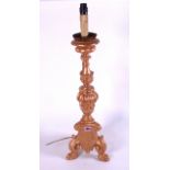 WITHDRAWN A CARVED GILTWOOD TABLE LAMP