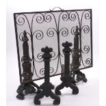 A CAST IRON FIRE SCREEN, FIRE DOGS AND A PAIR OF ANDIRONS (5)