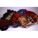 A COLLECTION OF WOMEN’S CLOTHING INCLUDING EMBROIDERED SOUTH ASIAN STYLE DRESSES