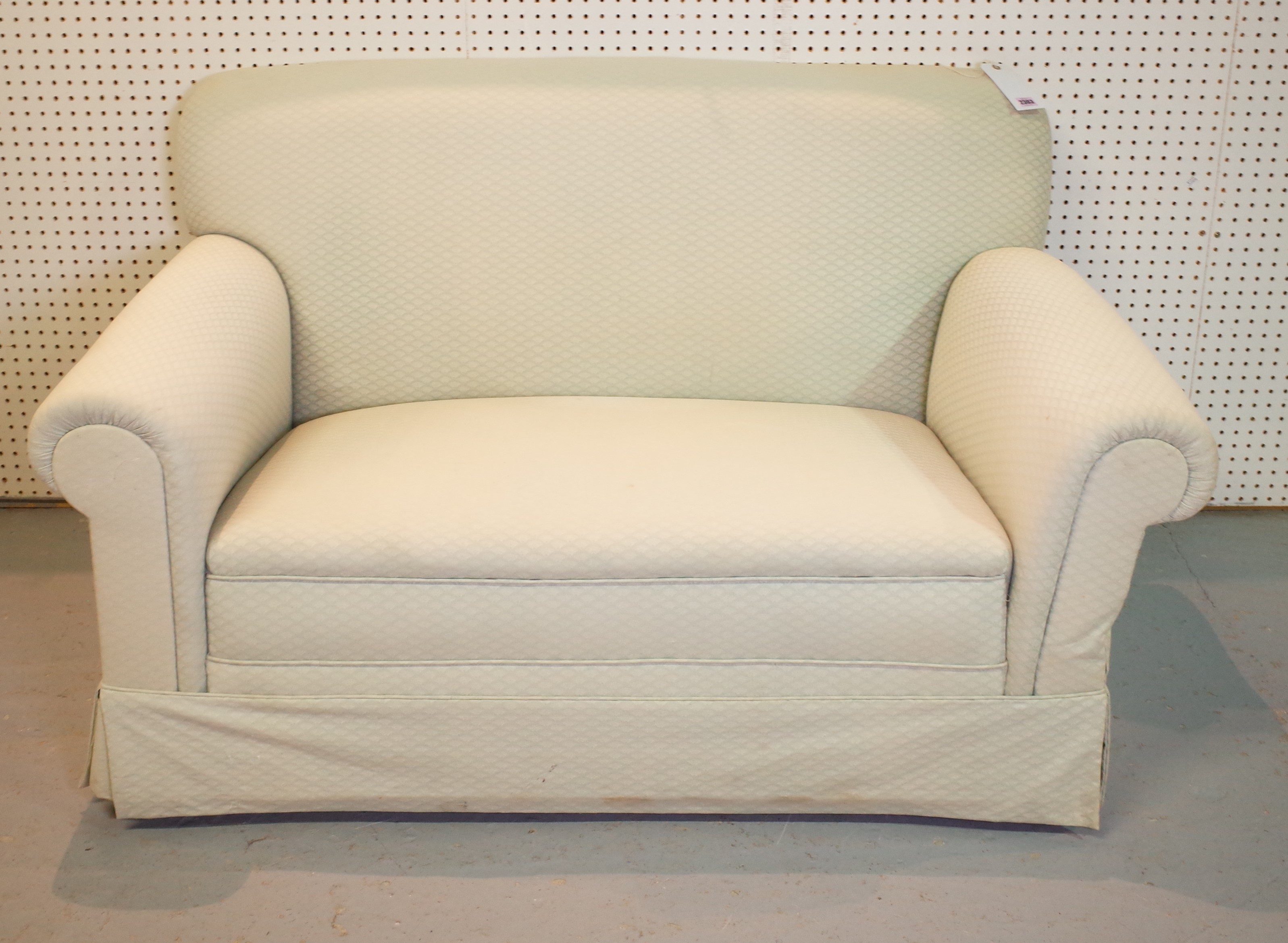 AN EARLY 20TH CENTURY DROP END SOFA