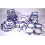 CERAMICS COMPRISING; A IRONSTONE BLUE AND WHITE DECORATED PART DINNER SERVICE (QTY)