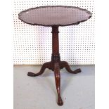 A MAHOGANY TRIPOD TABLE WITH PIE-CRUST TOP