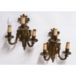 A PAIR OF REGENCY STYLE GILT-METAL THREE LIGHT WALL APPLIQUÉS (2)