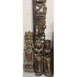 A PAIR OF MODERN ASIAN CARVED HARDWOOD FIGURAL WALL HANGINGS (4)