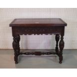 A VICTORIAN OAK FOLDOVER CARD TABLE