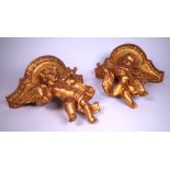 A PAIR OF MODERN GOLD PAINTED PLASTER WALL BRACKETS (2)