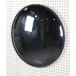 A MODERN SHADED GLASS CONVEX WALL MIRROR