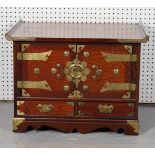 A MODERN CHINESE HARDWOOD AND BRASS BOUND LOW CUPBOARD