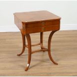 A BIEDERMEIER GILT-METAL MOUNTED FRUITWOOD CANTED SQUARE TWO DRAWER WRITING TABLE