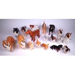 BESWICK; A GROUP OF EIGHTEEN CERAMIC FIGURES OF DOGS (18)