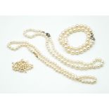 THREE SINGLE ROW NECKLACES OF CULTURED PEARLS (3)