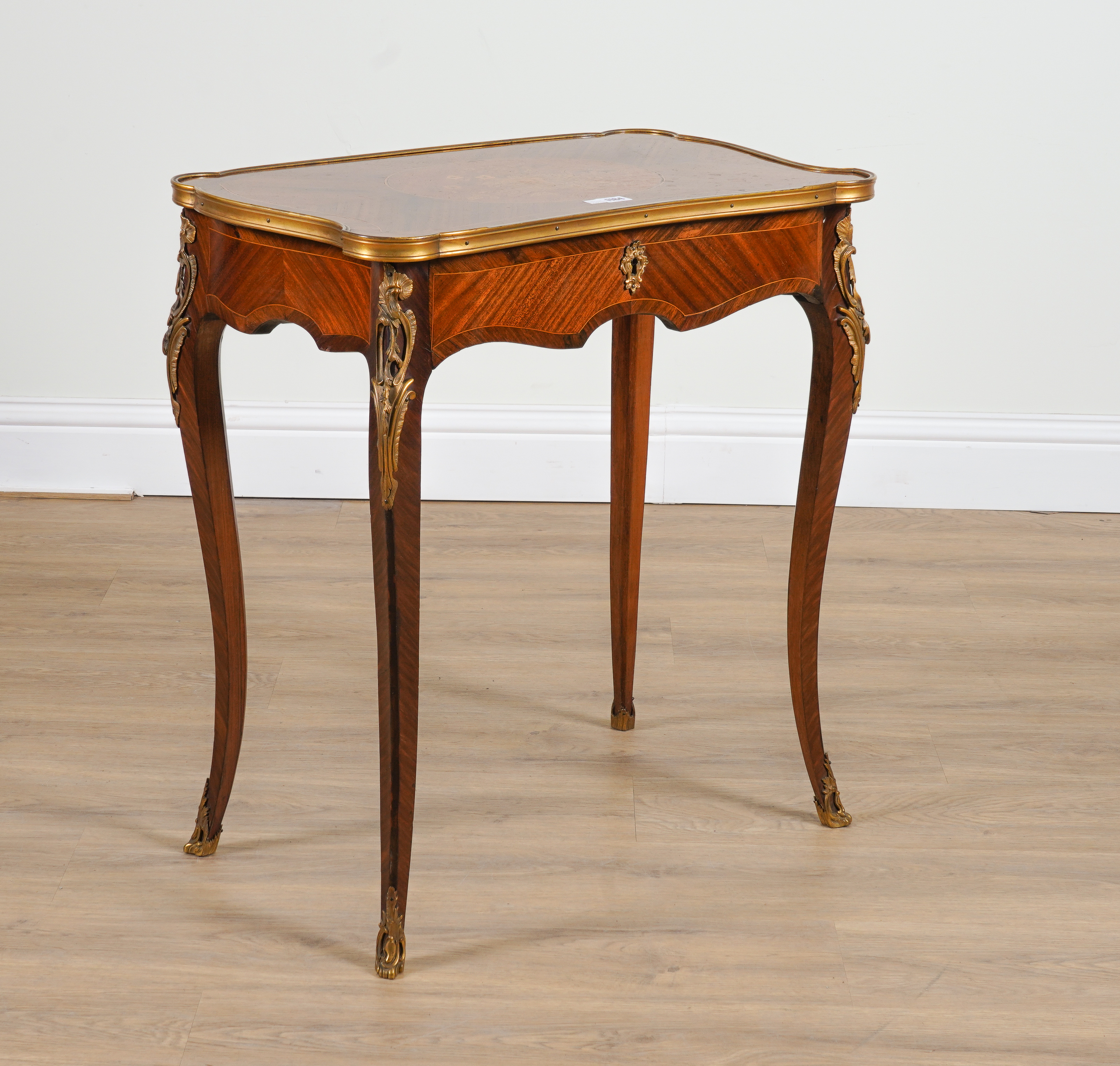 A LATE 19TH CENTURY FRENCH GILT METAL MOUNTED FLORAL MARQUETRY INLAID MAHOGANY AND KINGWOOD...