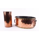 A COPPER AND BRASS RIVETED JARDINIERE OR WINE COOLER (2)