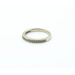 A 9CT WHITE GOLD AND DIAMOND HALF ETERNITY RING