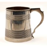 A GEORGE III SILVER MUG