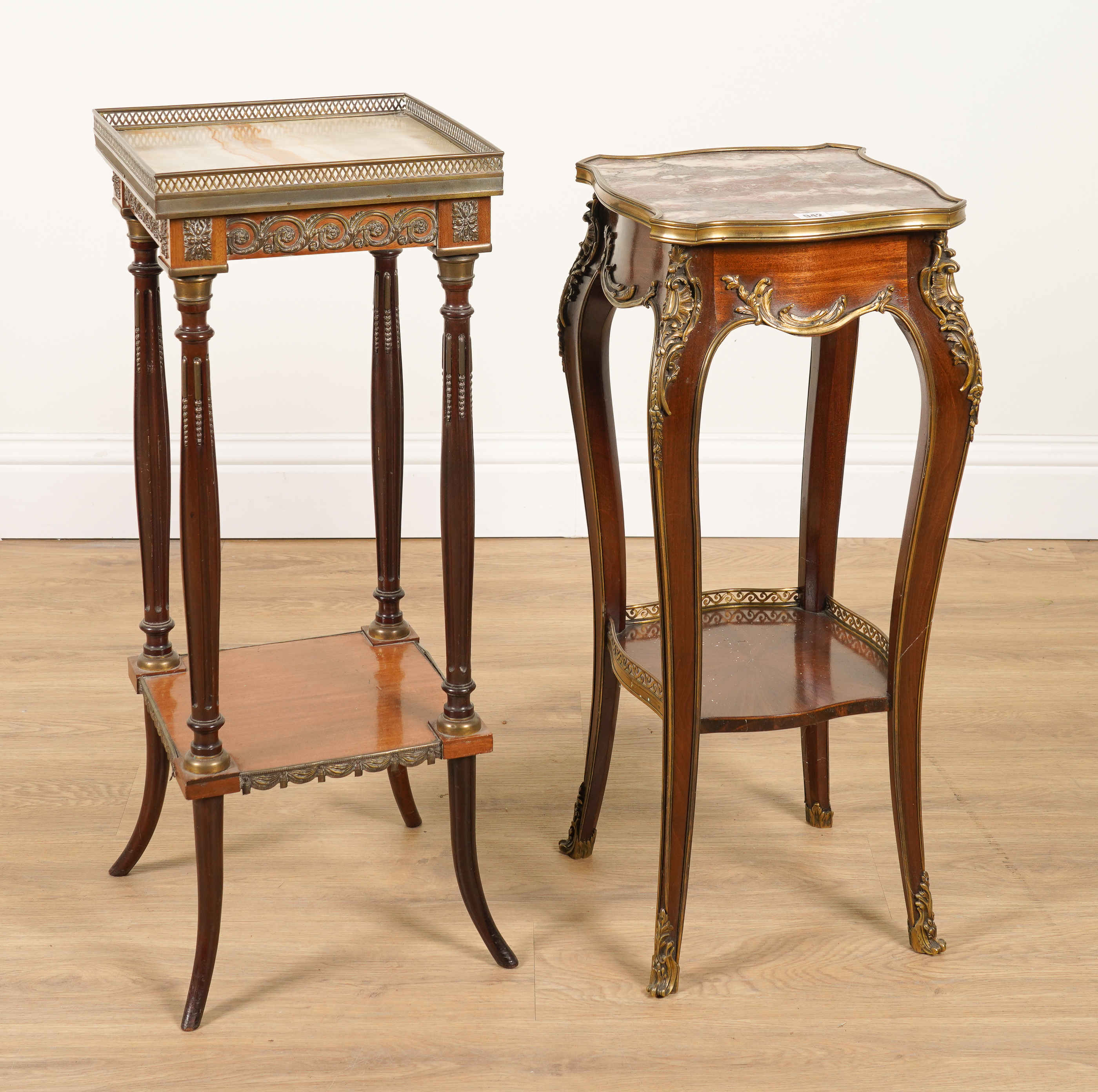 A LATE 19TH CENTURY FRENCH GILT-METAL MOUNTED MARBLE TOPPED TWO TIER OCCASIONAL TABLE (2)