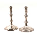 A PAIR OF QUEEN ANNE BRITANNIA STANDARD SILVER TAPERSTICKS