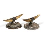 A PAIR OF LATE VICTORIAN SILVER MOUNTED HORN KNIFE RESTS