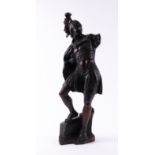 A NORTH EUROPEAN CARVED OAK FIGURE OF A ROMAN CENTURION