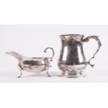 A SILVER MUG AND A SILVER SAUCEBOAT (2)