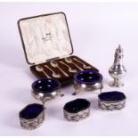 A SET OF SIX SILVER COFFEE SPOONS AND A GROUP OF SILVER CONDIMENTS (7)