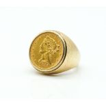 A GOLD COIN RING