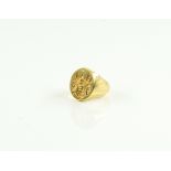 AN 18CT GOLD OVAL SIGNET RING