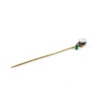 A VICTORIAN DIAMOND AND EMERALD STICK PIN