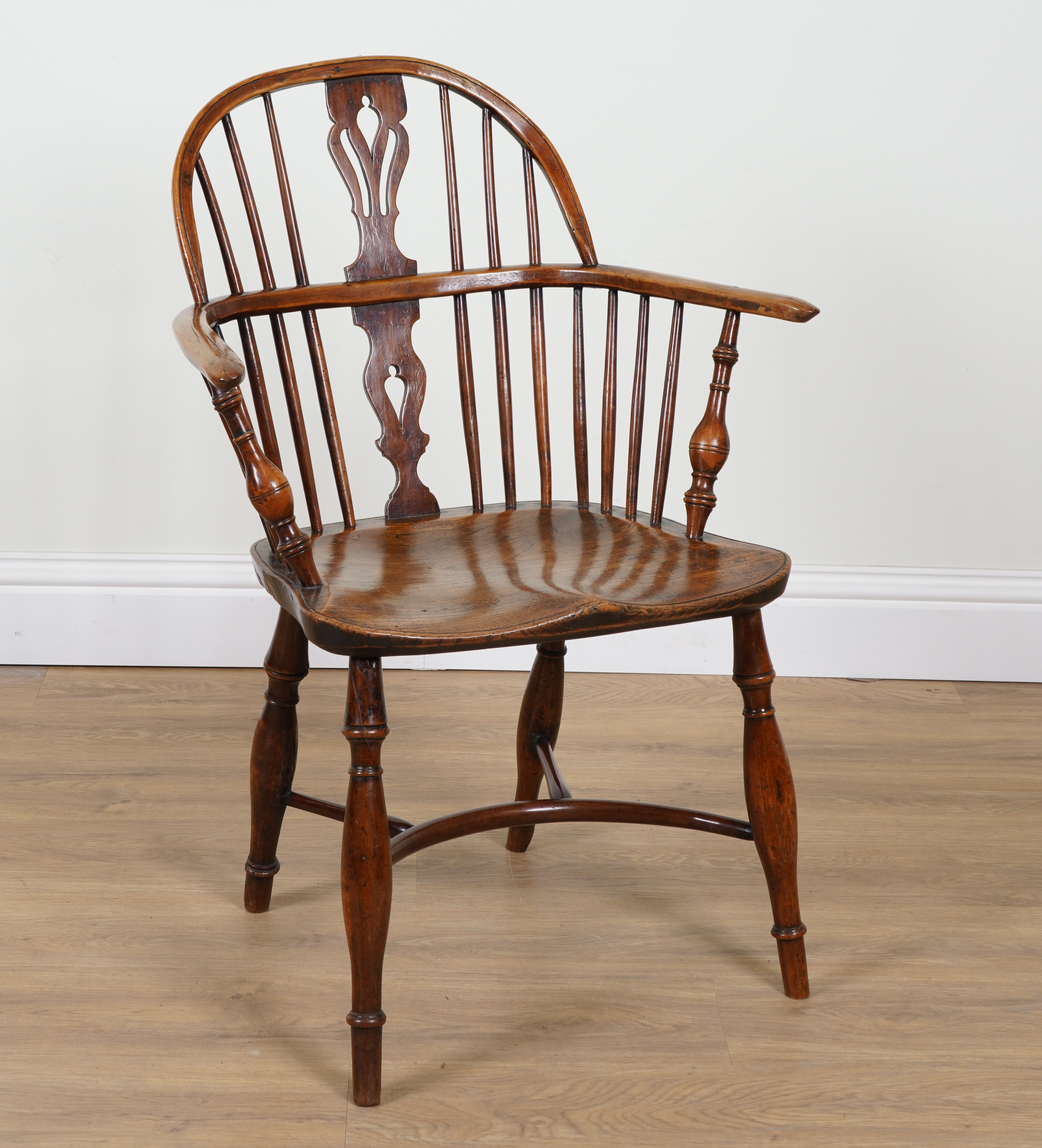 TAYLOR GRANTHAM; A 19TH CENTURY YEW AND ELM WINDSOR CHAIR