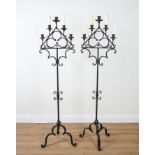 A PAIR OF WROUGHT-IRON FIVE LIGHT FLOOR STANDING CANDELABRA (2)