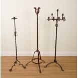 THREE WROUGHT-IRON FLOOR STANDING CANDELABRA (3)