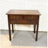 A GEORGE III MAHOGANY THREE DRAWER LOWBOY