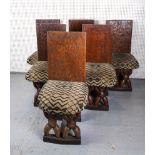 A SET OF SIX TRIBAL STYLE HARDWOOD DINING CHAIRS (6)