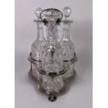 A SILVER PLATED THREE DIVISION DECANTER HOLDER
